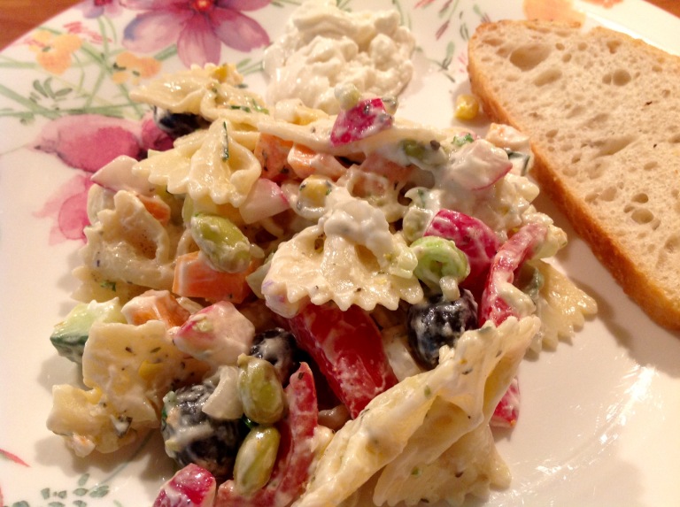 Pasta salad, vegan mayonnaise and ciabatta