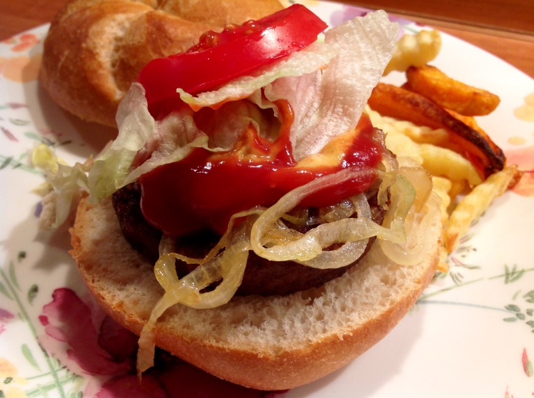 Vegan burgers and onions in a bun