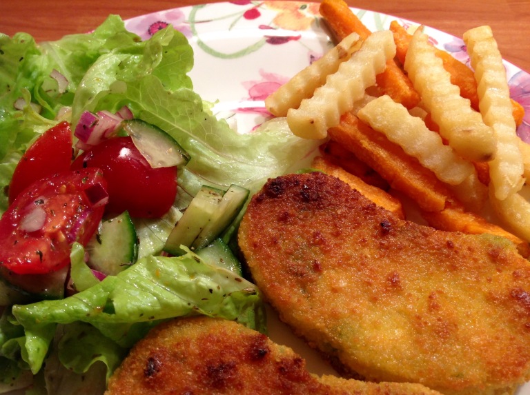 Vegetable cutlets with potato fries and salad