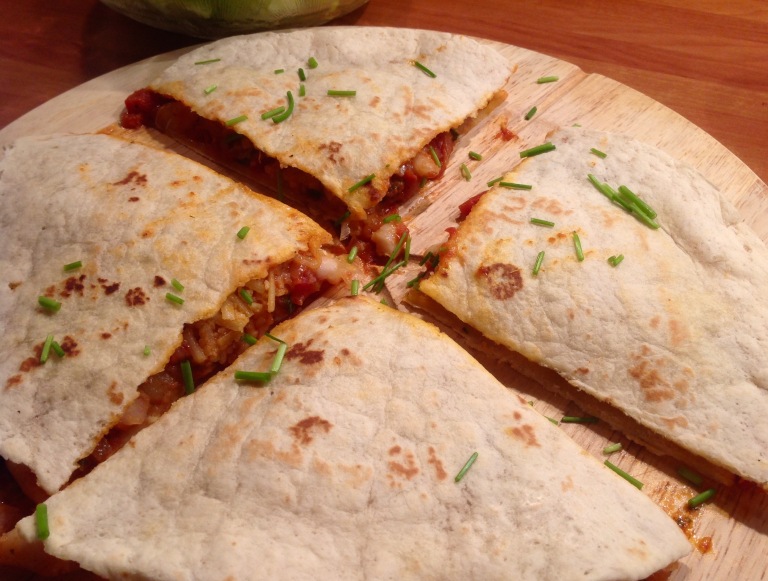 Quesadillas with tomatoes, beans and vegan cheese