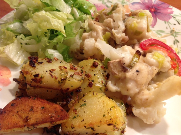 Cauliflower gratin, fried potatoes and salad