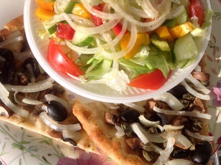 Pizza bread with extras and salad
