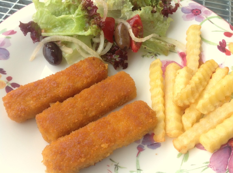 Vegan fish fingers, potato fries and Greek salad