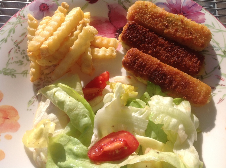 Veggie fingers, potato fries and salad