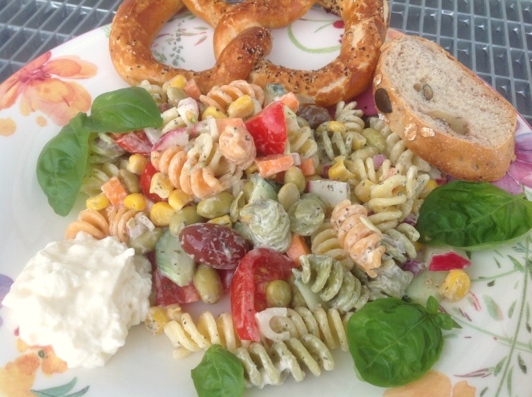 Pasta salad with garlic mayonnaise and pretzel