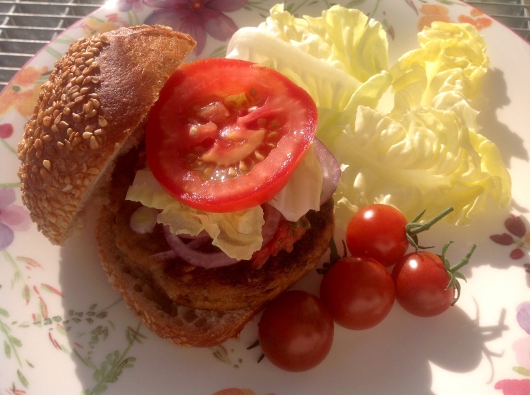 Tofu and vegetable patties with salad in a spelt bun
