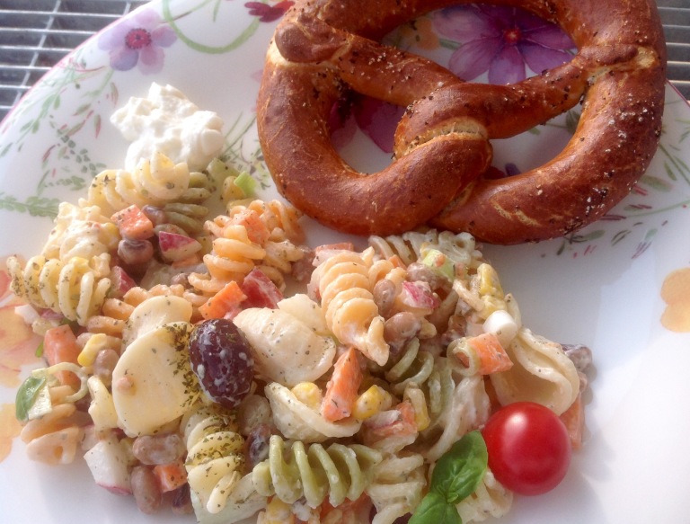 Pasta salad, vegan mayonnaise and pretzel