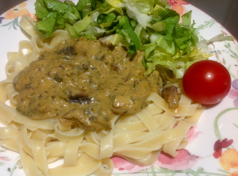 Tagliatelle with mushroom sauce and endive salad